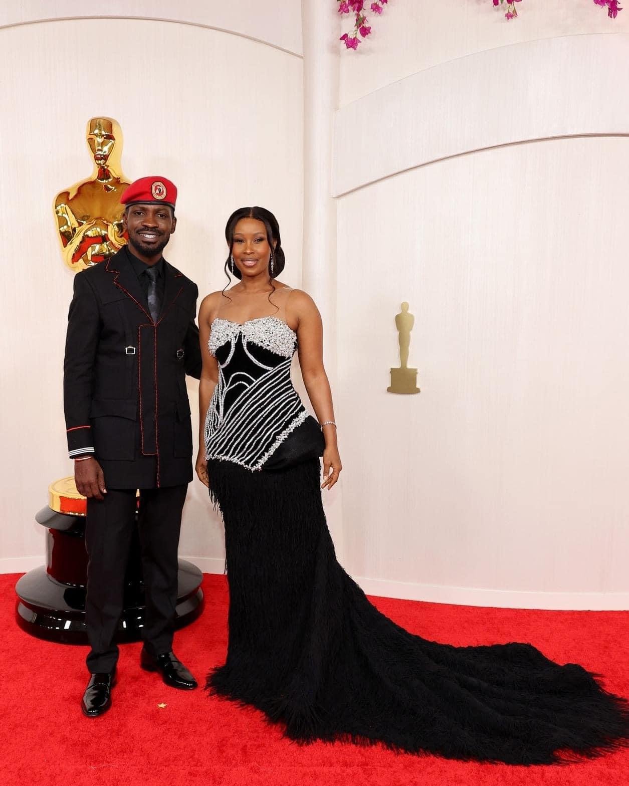 Glamorous Duo: Bobi Wine and Barbie Radiate Elegance at the Oscars