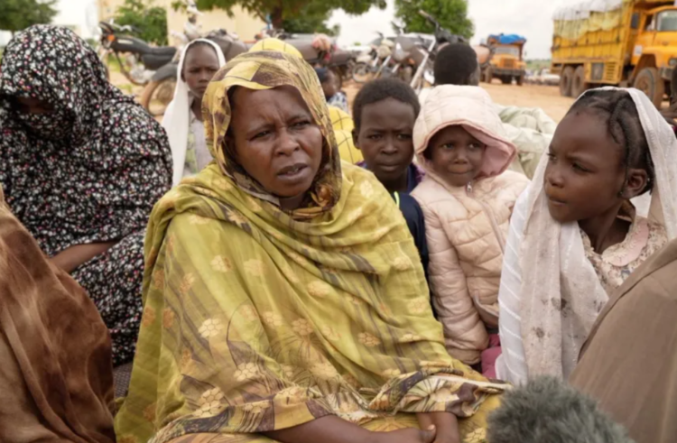 Kevin McGregor / BBC
Buthaina and her children travelled hundreds of miles to Sudan's border with Chad after food and water ran out at home