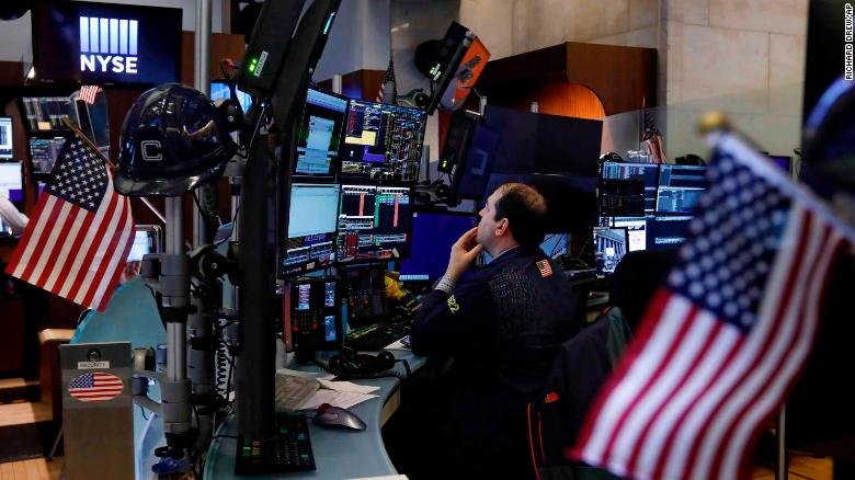 US stocks halted after falling 7%. Global stocks plunge as oil crashes and coronavirus fear spreads